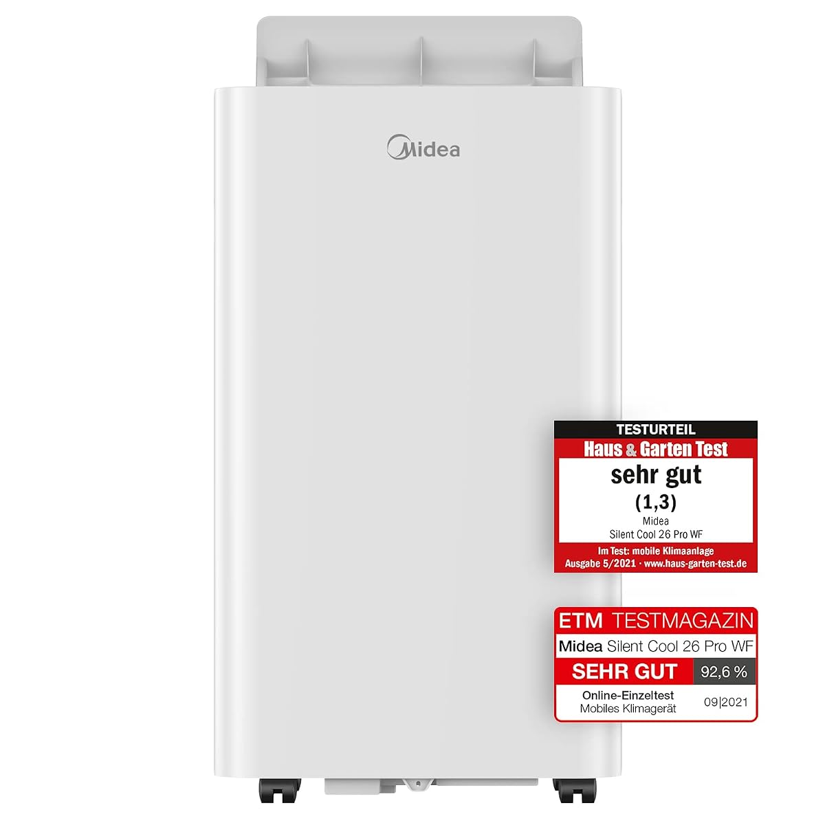 Climatiseur mobile blanc Midea avec tuyau d’évacuation près d’une fenêtre dans un intérieur lumineux